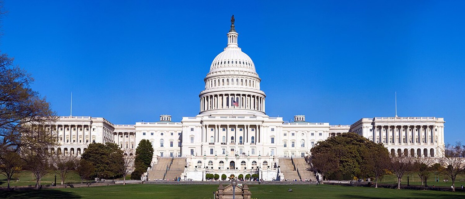 An image of the US Capitol on the west side, facing the national mall.